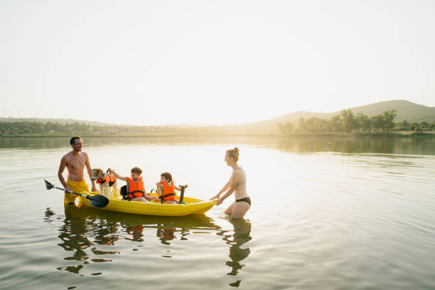 istock Family kayaking on the lake 1327358811