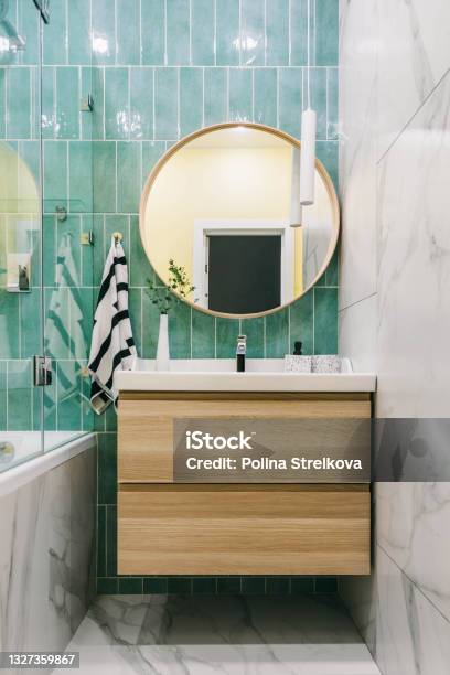 Stylish Modern Luxurious Marble And Green Tiles Bathroom With Washbasin Stock Photo - Download Image Now