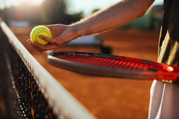 istock Racket, tennis ball, net 1327365063
