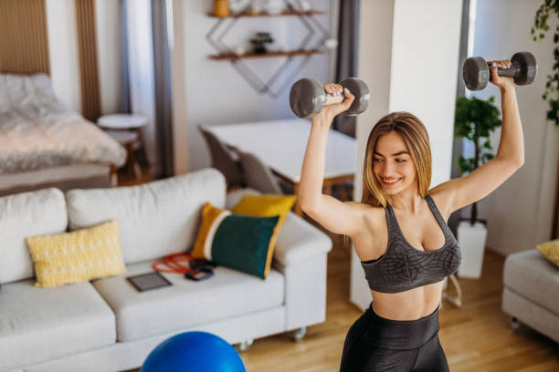 istock Young woman exercising 1327365481
