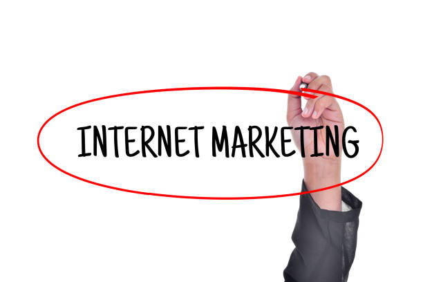 istock Hand writing a word INTERNET MARKETING on white background 1327366070