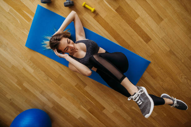 istock Young woman exercising 1327366217