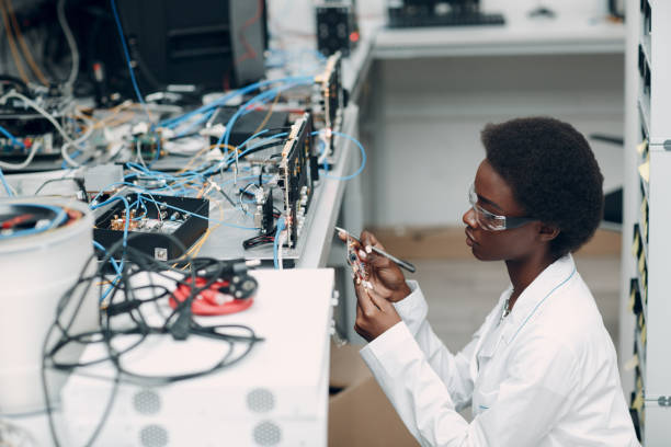 istock Scientist african american woman working in laboratory with electronic instruments 1327370058