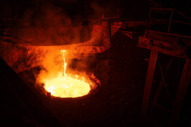 istock Liquid steel is poured from a metallurgical ladle 1327375155