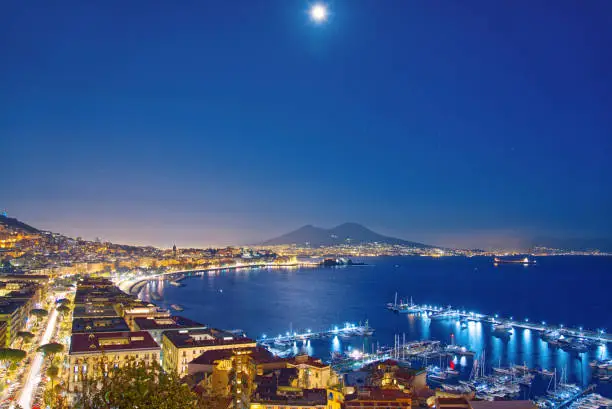 View of the sea in the moonlight in the province of Naples, Italy