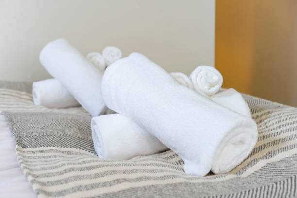 istock White towel placed on the bed 1327380303
