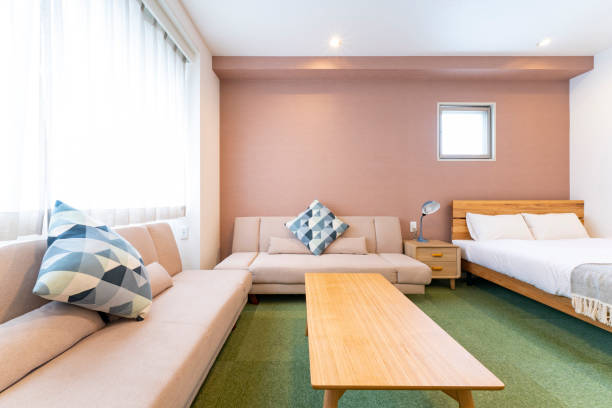 istock Hotel room with sofa and bed 1327380485