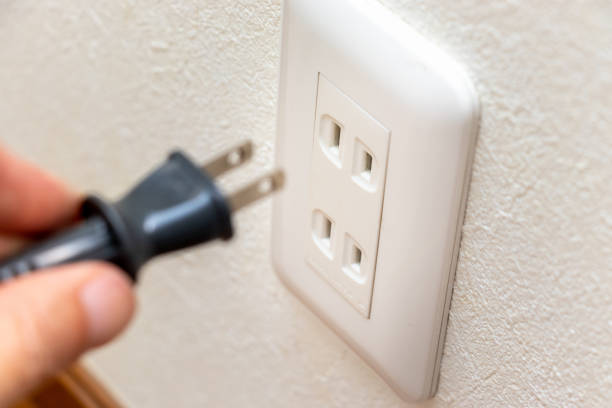 istock Electric outlet and power plug 1327381296