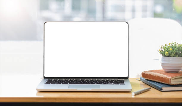 istock Blank screen Laptop computer and poster workspace background in modern office 1327383640