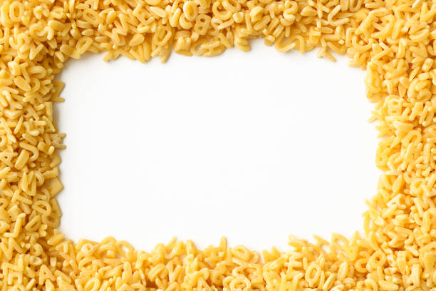 Alphabet soup pasta close-up (uncooked). Can be used as a background.