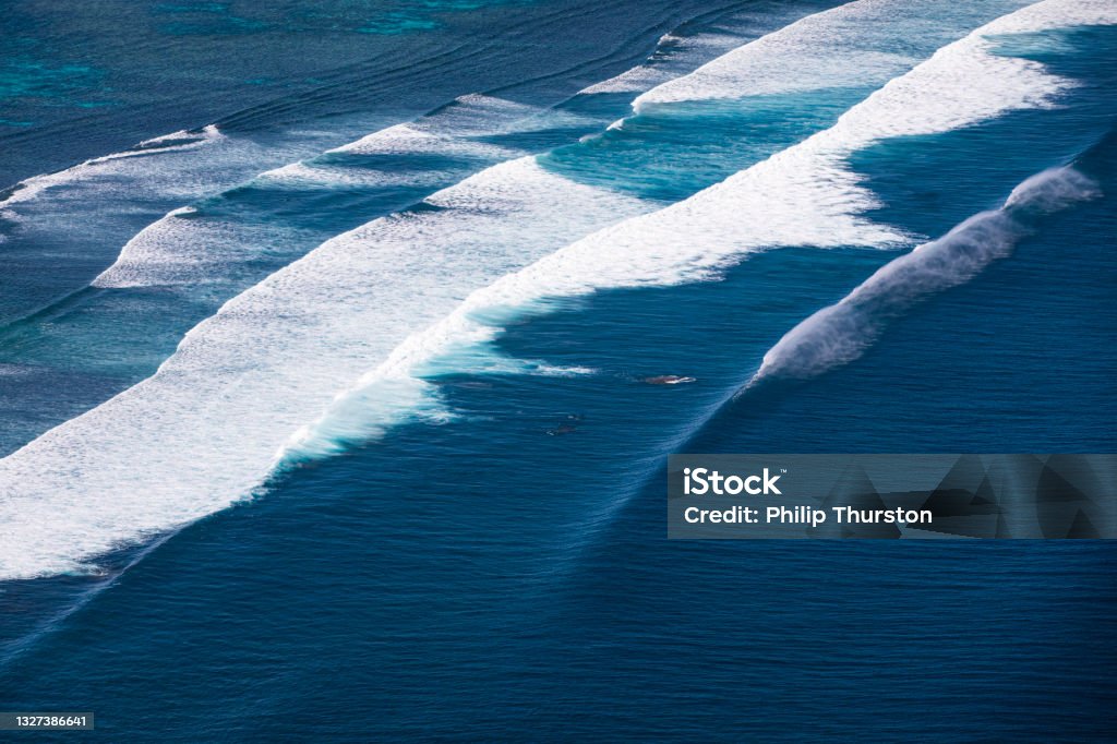 Drone shot of deep blue swell lines in pacific ocean Wave - Water Stock Photo
