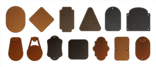 Leather label. Realistic blank badges. Premium bag tags. Jeans patches stitched at edges with copy space. Isolated stickers set for branding. Vector natural or faux calfskin samples Leather label. Realistic blank badges. Premium quality bag tags. Jeans patches stitched at edges with copy space. Isolated various stickers set for branding. Vector natural or faux calfskin samples textile patch stock illustrations