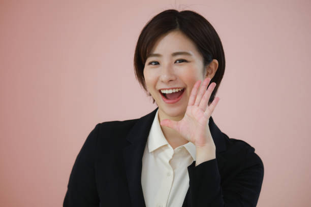 istock Female employees cheering 1327391507