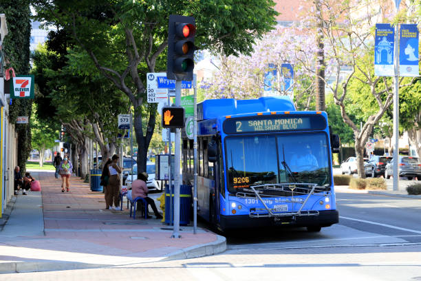 Los Angeles, California, USA - July 05, 2021: Big Blue Bus Route 2 at Westwood, UCLA.\n\nPassengers are boarding the bus.
