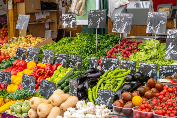 istock Market stall with different kinds of fresh vegetables 1327392495