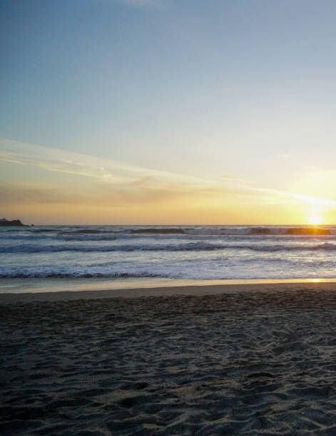 istock Watching the sunset at Baker Beach in San Francisco 1327396914