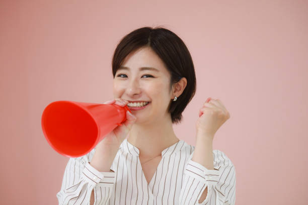 女性、メガ - 応援 ストックフォトと画像