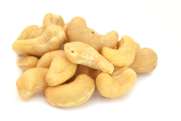 istock Cashew portion closed up isolated on white 1327398884
