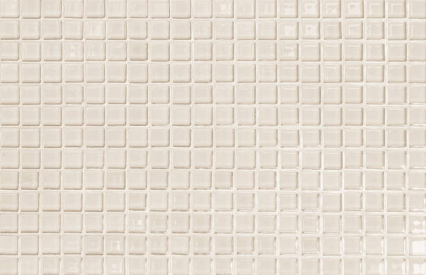 istock Cream pastel ceramic wall and floor tiles abstract background. Design geometric mosaic texture decoration of the bedroom. Simple seamless pattern for backdrop advertising banner poster or web. 1327402638