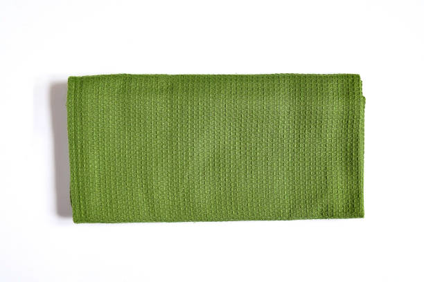 istock Top view new kitchen towel in verdun green color simple pattern in differnet style on white background .Equipment necessary  in kithchen for wippe things. 1327403065