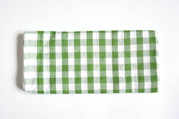 istock Top view new kitchen towels in verdun green ,strip and white color simple pattern in differnet style on white background .Equipment necessary  in kithchen for wippe things. 1327403104