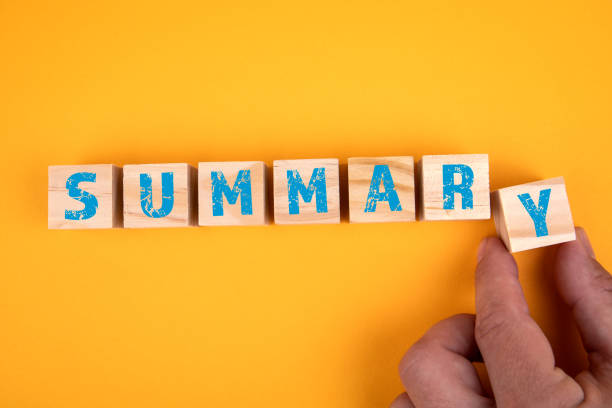 istock SUMMARY concept. Wooden blocks with letters on a yellow background 1327404617