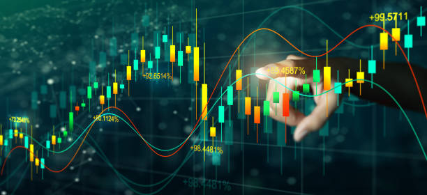 istock Businessman hand on digital screen with financial graphs, lines and candlestick. Double exposure. 1327409184