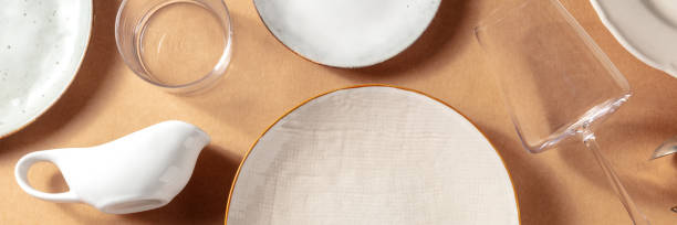 istock Tableware panorama with plates and glasses, overhead flat lay shot 1327410342