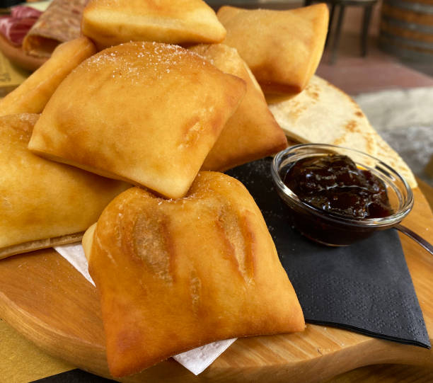 istock Gnocco fritto. Traditional Italian Emilia Romagna region appetizer, substitute for bread made with fried dough. Italy 1327411281