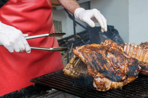 istock The cook cooks on the coals ribs bbq 1327416411