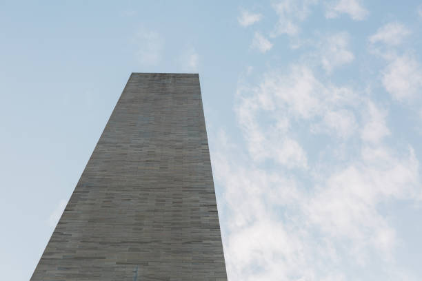 istock Low Angle View Of Monument Against Cloudy Sky 1327420550