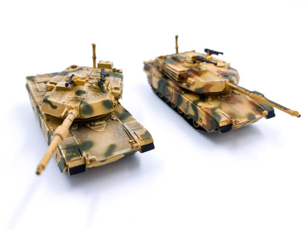 istock Modern tank model toy on white background 1327420736