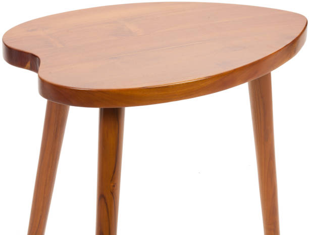 istock Small antique wooden table isolated 1327421685