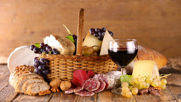 istock wicker basket with red wine,  cheese and salami 1327422803