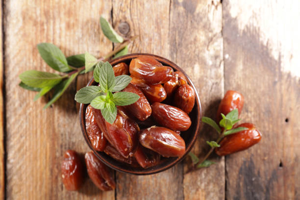 istock fresh fruits dates and mint 1327422894