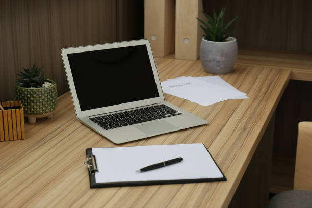 istock Receptionist's workplace with laptop in hotel. Interior design 1327425659