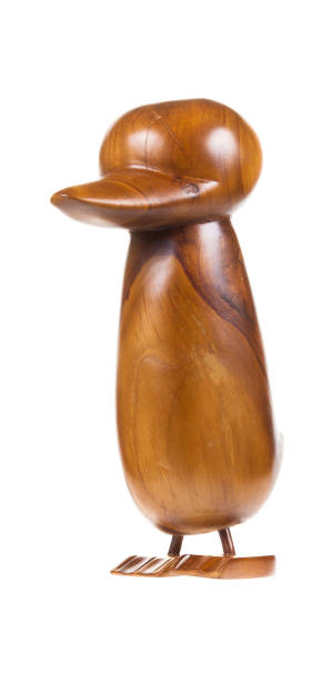 istock Carved wooden bird on the white background 1327429332