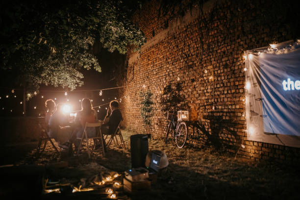 istock Friends on dinner party in back yard 1327434526