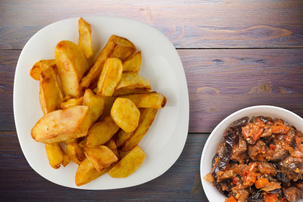 istock fry potatoes on a wooden background 1327434554