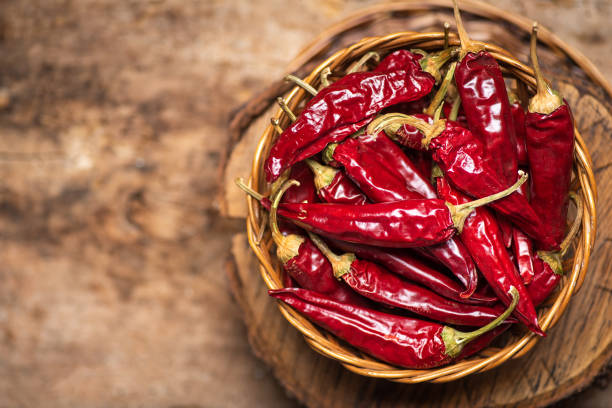 Dried red peppers in a bowl top view