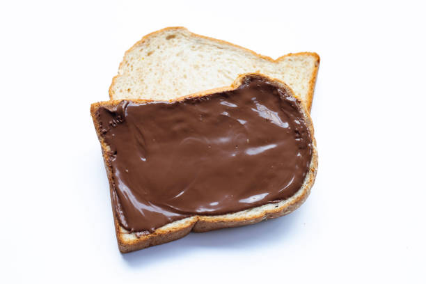istock Bread with sweet chocolate hazelnut on white 1327438348