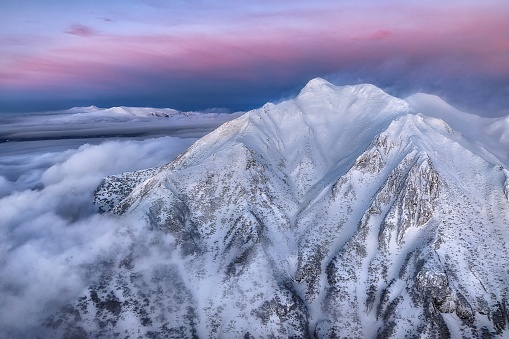 This is a winter sunset scenery of Mt.Shari in Hokkaido prefecture, Japan.\nMt.Shari is located in Shari city, it is well known as a entrance point of Shiretoko area in this prefecture.\nShiretoko is well known as the World Natural Heritage Site.