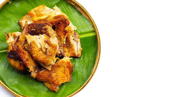 istock Grilled chicken, Thai style food on banana leaf 1327439536
