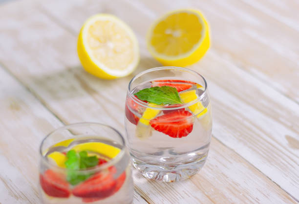 istock summer cocktail of citrus and berries. 1327442615