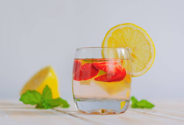 istock homemade refreshing lemonade with strawberries and mint. 1327443185