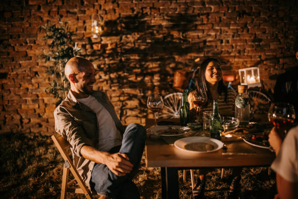istock Group of friends on dinner party 1327444919
