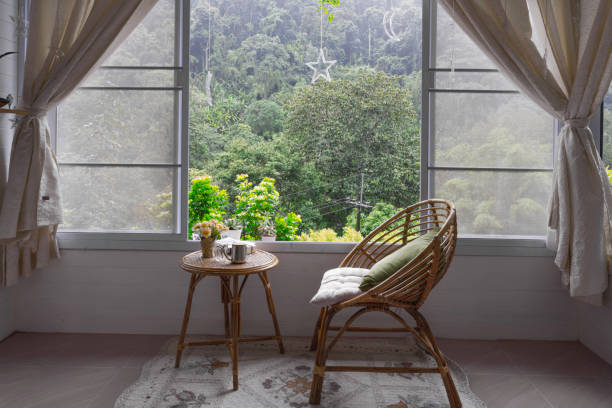 istock Living room with green forest background 1327446551
