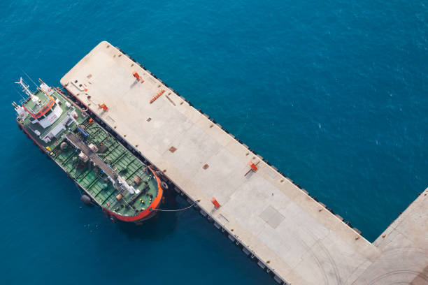 istock Tanker ship with green deck is moored in Jedda port 1327448007