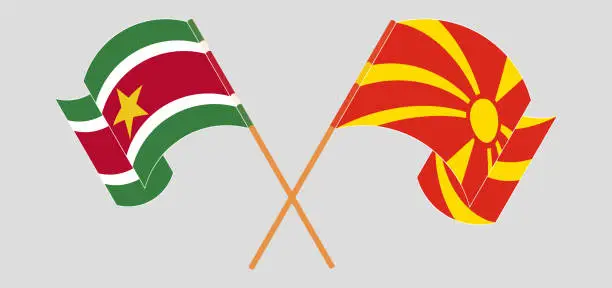 Vector illustration of Crossed and waving flags of Suriname and North Macedonia