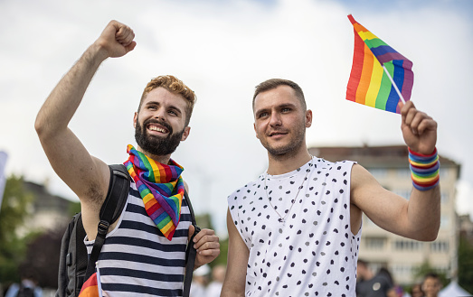 Young gay men partying at the annual LGBTQIA parade